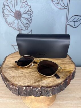 Calvin Klein Gold Frame Sunglasses with Dark Lenses
